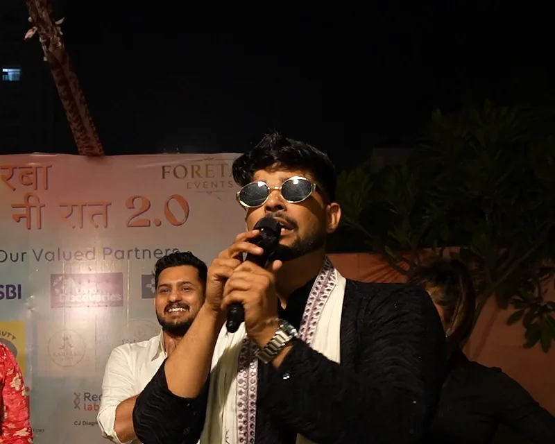 Ashish on the mic on stage at Suncity Garba Ni Raat 2.0